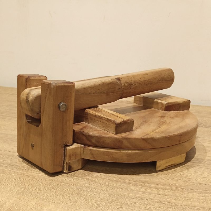 Handmade wooden roti maker for chapati and paratha preparation