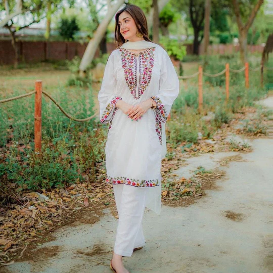 Sophisticated White 2PC Stitched Suit with Elegant Pocket Sequence Embroidery for Timeless Occasions - Open Market Pakistan